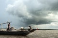 The fisherman`s life on boat in the bank of river.