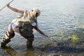 Fisher woman catching fish