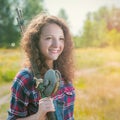 Fisher woman with wintage fishing pole Royalty Free Stock Photo