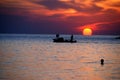 Fisherboat at sunset