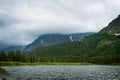 Fishercap Lake in Glacier National Park on a cloudy summer day Royalty Free Stock Photo