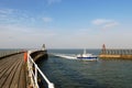 Fisheries patrol boat entering Whitby harbour Royalty Free Stock Photo