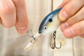 Fisherman attaches the plug to the wire line