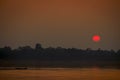 Fisherman back to home at sunset