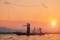 Fisherman of Bangpra Lake in action when fishing Royalty Free Stock Photo