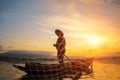 Fisherman of Bangpra Lake in action when fishing Royalty Free Stock Photo