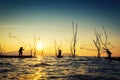 Fisherman of Bangpra Lake in action when fishing Royalty Free Stock Photo