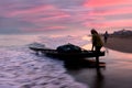 Fisherman on The Beach