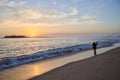 Fisherman on the beach of Moledo at sunset