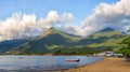 Fisherman beach surrounded by mountains Royalty Free Stock Photo