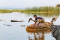 Fisherman with Birds in Lake Awassa in Ethiopia