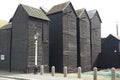 Fisherman black wooden huts at Hastings, England