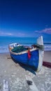 Fisherman Boat on The Beach with Blue Sky Background Royalty Free Stock Photo