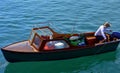 Fisherman in a boat with a fishing rod Royalty Free Stock Photo