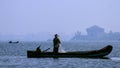 Fisherman in a boat. Photo from Cochin, Kerala in India Royalty Free Stock Photo