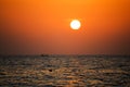 Fisherman boat silhouette at sunset Royalty Free Stock Photo