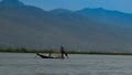 Fisherman on the boat at the sunrise, Inle lake Myanmar Royalty Free Stock Photo