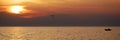 Fisherman boat sunset