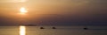 Fisherman boat sunset Royalty Free Stock Photo