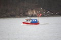 Fisherman boat on the way to the fishing grounds in the sea is followed by hungry seagulls Royalty Free Stock Photo