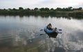 Fisherman boating on the river. Details and close-up