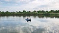 Fisherman boating on the river. Details and close-up