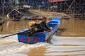 Fisherman boating, Tonle Sap, Cambodia