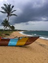 Fisherman boatpiroga on the Indian ocean shore. Hambantota, Sri Lanka