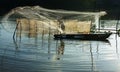 Fisherman cast a net on river