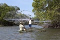 A fisherman casts his net into Pottuvil Lagoon on the east coast of Sri Lanka.