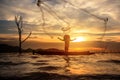 Fisherman catch fish by his fishing net. Royalty Free Stock Photo