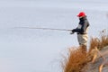 Fisherman catch a pike