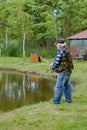 Fisherman catches of salmon fly fishing in the lake