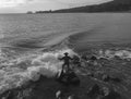 A fisherman catching fish in Lombok, Indonesia