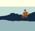 Fisherman is catching fish on shore of mountain lake. Royalty Free Stock Photo