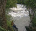 Fisherman, catching trout fish in a mountain river