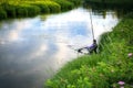 Fisherman caught fish on the river in the countryside. Royalty Free Stock Photo