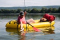 Fisherman caught a fish from rubber boat