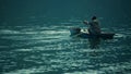 A fisherman is checking his net for fishes in Samosir Island, Toba Lake, North Sumatra, Indonesia. Royalty Free Stock Photo