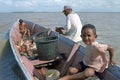 Fisherman, children and fish, Galibi, Surinam Royalty Free Stock Photo