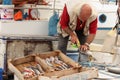 Fisherman Cleaning Fish Royalty Free Stock Photo