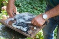 Fisherman cleaning a squid