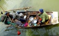 A fisherman couple selling fishes