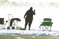 Fisherman in the Dawn Fog Royalty Free Stock Photo