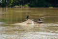 Fisherman do fishing on river