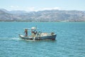 Fisherman driving traditional fishing boat 3