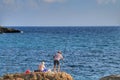 Fisherman in the evening on Isla Plana beach in Cartagena