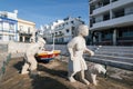 Fisherman family statue in Albufeira city.