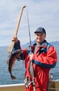 Fisherman with fish Royalty Free Stock Photo