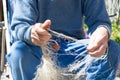 Fisherman with the fish net Royalty Free Stock Photo